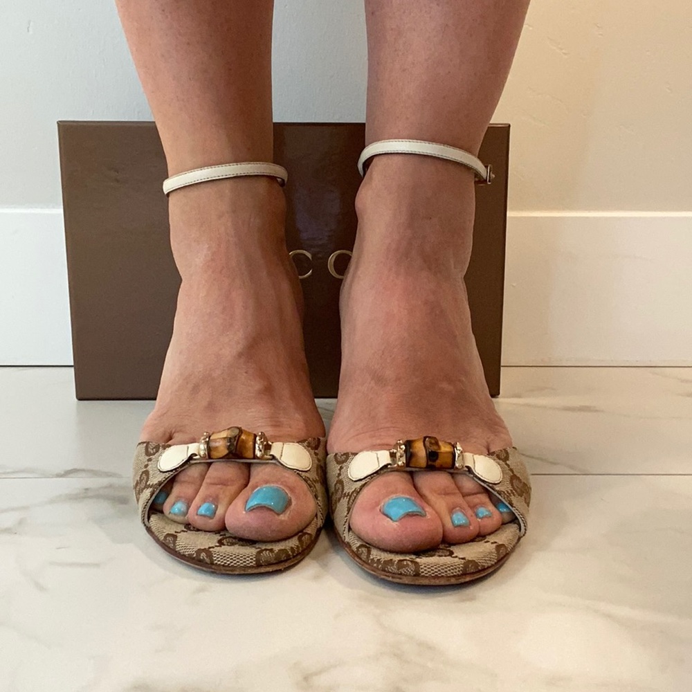 Gucci logo sandal heels.